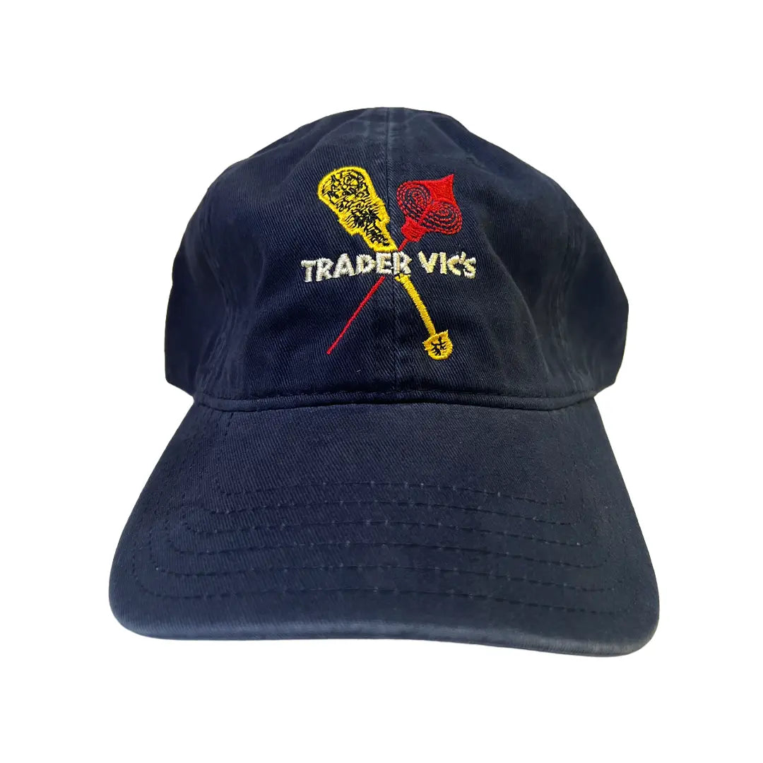 Navy blue cap with embroidered logo and 'Trader Vic's' text on a white background