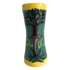 Green and yellow mug with tree design.