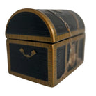 A decorative treasure chest with a dark textured black body and ornate gold-colored trim, rope details, and a small hanging key, shown on a plain white background.