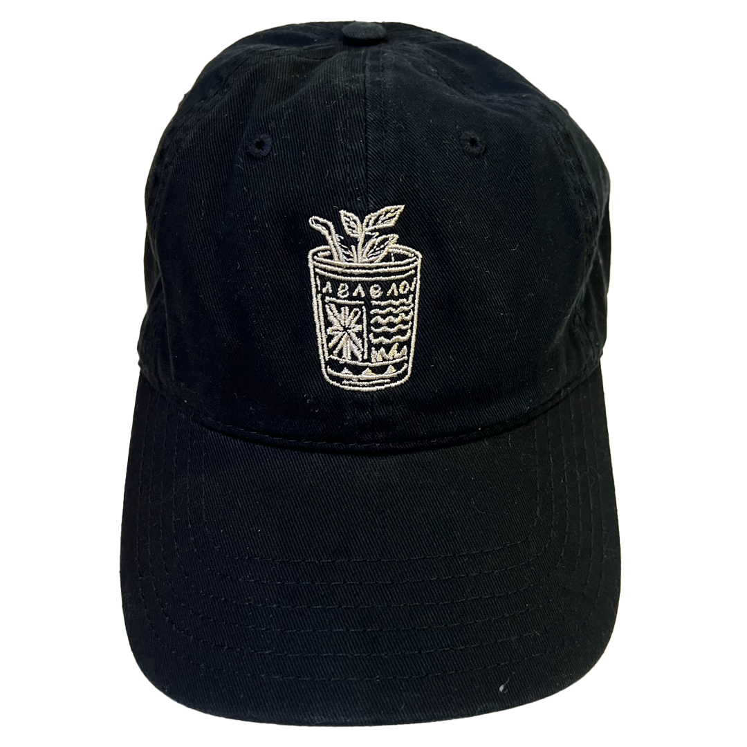 Black cap with white embroidered design on a white background