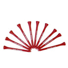 Red golf tees with 'Trader Vics' branding on a white background