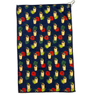 Towel with tropical pattern featuring drinks, flowers, and leaves on a blue background